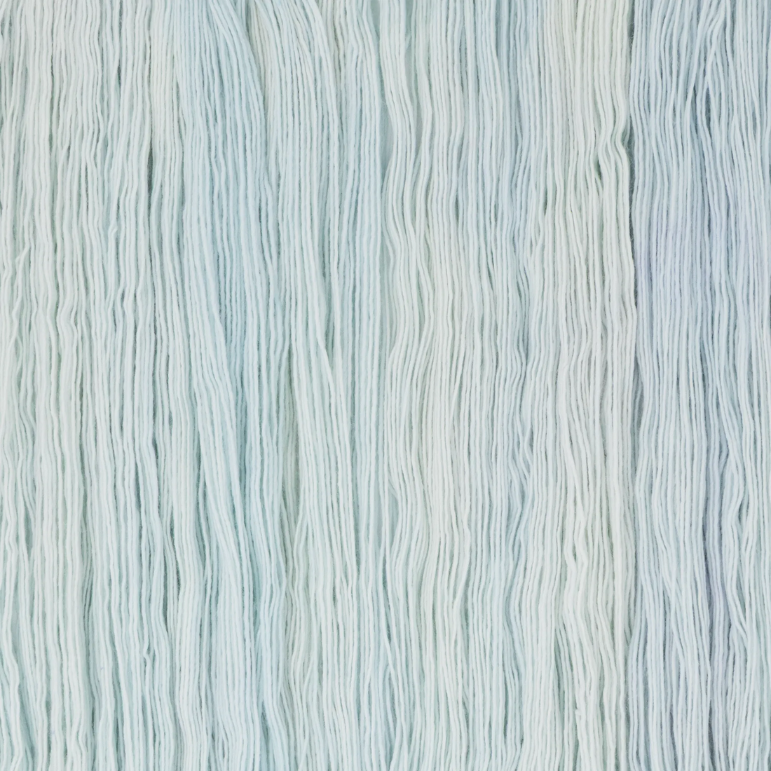 Sysleriget hand dyed yarn in single ply merino wool in the color Spring Sky.