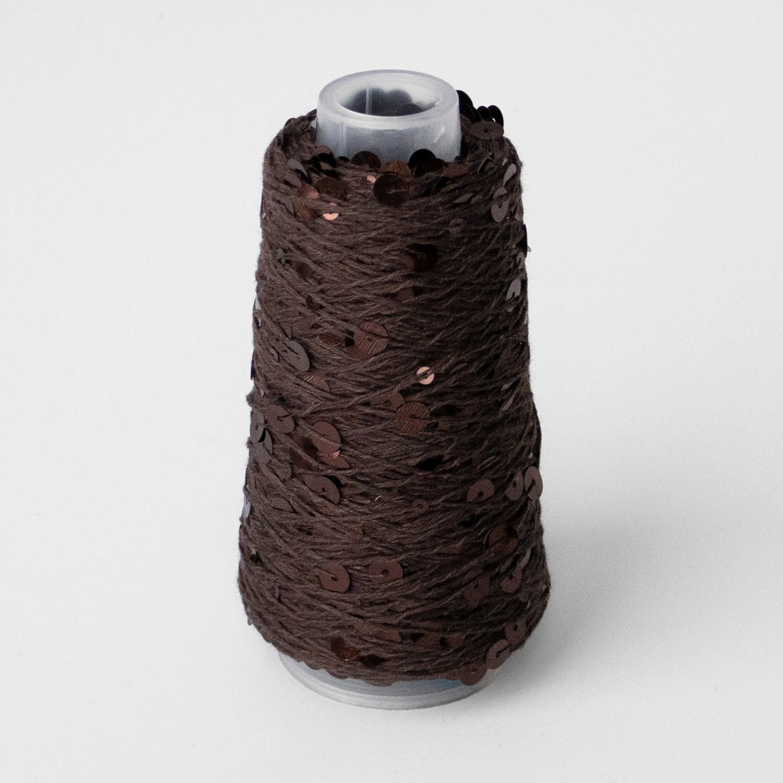 Sysleriget Sequins yarn on cotton base in the color 113 Brun.